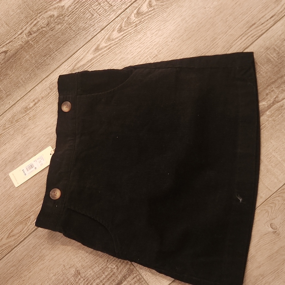 Girls black corduroy skirt.  New W/tags!!  Size M